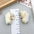 Close-up of 2.5cm flocked puppy charms with size ruler for DIY jewelry making - 24*20MM / Light Tan Lying Puppy