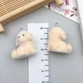 Close-up of cream flocked puppy charm with silver ring showing texture and dimensions - 25*23mm / Light Tan Puppy