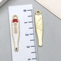 Detailed view of enamel thermometer pendant showing 37.0°C text and golden alloy back - White Thermometer Style (18901) / 30x6mm