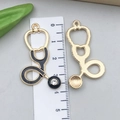 Pendentif stéthoscope doré avec finition émail noir et cristal pour bijoux DIY - Stéthoscope Émail Noir 43x23mm (23232)