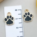 Black enamel cat paw charms with gold plating and measurement scale for size reference - Black (KC Gold)