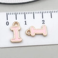 Ciondolo lettera I in smalto rosa con bordo dorato per la creazione di gioielli - Lettera I