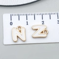 White enamel letter N and Z charms in gold metal finish for DIY jewelry making - Letter N