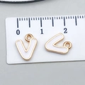 White enamel V-shaped letter pendant in gold alloy finish with 1.3cm size scale - Letter V