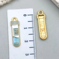 Test tube shaped pendant in gold and light blue finish for DIY jewelry making - Blue Enamel Test Tube