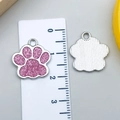 Silver alloy cat paw charm with pink glitter oil drip and size scale measurement - Pink