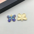 Blue enamel butterfly charm with gold plating and detailed texture for DIY jewelry making - Blue Floral Butterfly (19023)