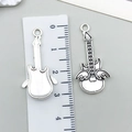 Antiksilberner Gitarrenanhänger mit Flügeln für DIY-Schmuck, 3.5cm Metallanhänger - Antiksilber Engelsflügel Gitarre (32x16mm)