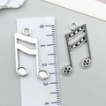Musikalben-Anhänger aus Silber für DIY-Schmuck in polierter und antiker Optik - Antiksilber Großes Musiksymbol (26x17mm)