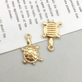 Pendentif tortue en or KC pour bijoux DIY avec texture de carapace et boucle intégrée - Tortue de Mer (11x18mm)