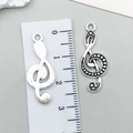 Antik-Silber G-Clef Musikanhänger für DIY-Schmuck mit 30mm Größenangabe auf Lineal - Antique Silver Treble Clef Symbol (29x11mm)