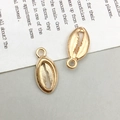 Pendentifs coquillages dorés avec texture et anneaux pour la création de bijoux - Coquillage (8x17mm)