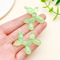 Light green translucent resin balloon dog pendants for DIY jewelry with silver loops - Fine Glitter Green