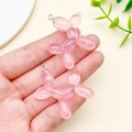 Pink translucent resin balloon dog charms with glitter finish and metal ring loops - Glittery Pink