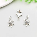 Detailed view of antique silver sea turtle charms for DIY necklaces and jewelry making - Medium Sea Turtle Shape
