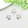 Detailed top view of three antique silver turtle charms for DIY jewelry making - Simple Sea Turtle Shape