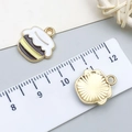 Enamel cupcake charms with golden trim and textured back for DIY jewelry making - Enamel Black Bee Yellow Honey Pot (18999)
