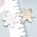 White enamel snowflake charm in gold-plated alloy for DIY jewelry making with back view - White Enamel Snowflake Style (14181)