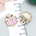 Pink and white enamel gift box alloy charm with ruler showing 2cm scale for DIY jewelry - Pink Enamel Christmas Gift Box Style (24817)