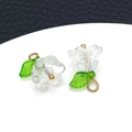 Translucent iridescent lily of the valley flower pendants with green leaves and gold rings - White