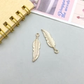 DIY golden alloy feather pendants for jewelry making with detailed texture and top ring loop - Long Leaf Style (11586)