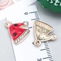 Macro detail of Christmas hat pendant with red and green rhinestones and ruler scale - Red Enamel Christmas Hat (12518)