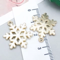 Macro view showing dimensions of white snowflake enamel charms with gold alloy plating - White Enamel Hexagon Snowflake (12536)