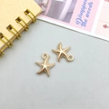 Set of two gold starfish alloy pendants for DIY jewelry making and craft projects - Starfish Style B (11606)
