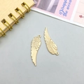 Golden wing pendant charms with detailed feather texture and rings for DIY jewelry - Wing Style B (11608)