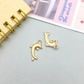 Pair of polished gold dolphin pendants for DIY jewelry making and necklace crafts - Dolphin Style (11620)