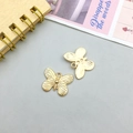 Pair of gold butterfly alloy pendants for DIY jewelry with detailed wing texture - Butterfly Style C (11621)