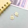 DIY jewelry making supplies featuring gold flower pendants with top loop for necklaces - Flower Style (11622)