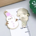 Pink enamel snowman charm in gold-plated alloy, front and back view for DIY jewelry - Pink Enamel Christmas Snowman
