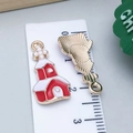 Emaille kersthuisje hanger in rood en wit met gouden achterkant en ophangoog - Rood Kerstkasteel (25460)