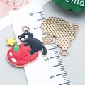 Cute black cat on red strawberry enamel charm with golden textured back and star accent - Red Enamel Star Apple Cat (25255)