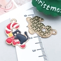 Christmas cat candy cane charm with black kitten and red striped oil drip finish - Red Enamel Bow Cane Cat (25256)