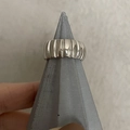 Minimalist silver wide grooved band ring in vintage style on a grey display cone - JZ0429-Striped Texture