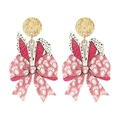 Detail of Easter bow earrings with pink glitter bunny ears and black polka dots - Pink Bow Bunny Ears Style