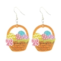 Close-up of Easter basket earrings with glitter eggs and pink bow decoration - Basket Full of Eggs Style