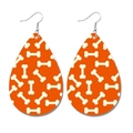 Halloween traanvormige oorbellen van oranje kunstleer met witte botten patronen - Oranje Bottenprint