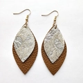 Detail of layered bohemian earrings with brown leather and silver leaf charms on white background - Silver Metallic Texture (22)