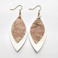 Detail view of double-layer leaf earrings with rose gold hair and white lychee leather - Rose Gold Texture (23)