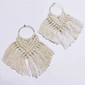 Detail of bohemian handmade cream woven tassel earrings with heart pattern and gold hoop - Off White