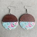 Macro detail of retro round wooden earrings with blue floral leather and silver fish hooks - Blue Rose Pattern (1)