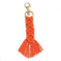 Handmade bohemian keychain with vibrant orange woven tassel and gold-tone metal clasp - Vibrant Orange