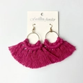 Detailed view of handmade magenta tassel earrings with bohemian woven cotton fringe - Rose Red