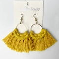 Handmade bohemian yellow tassel fan earrings on a white jewelry display card - Yellow