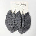 Detailed view of handmade grey cotton leaf fringe earrings on a white jewelry display card - 大号灰色款式 (B3)