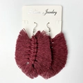 Detailed view of wine red leaf-shaped woven cotton tassel earrings on a display card - 大号酒红色款式 (B5)