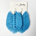 Close-up of light blue handmade woven fringe earrings with silver hooks on jewelry card - 大号浅蓝色款式 (B8)